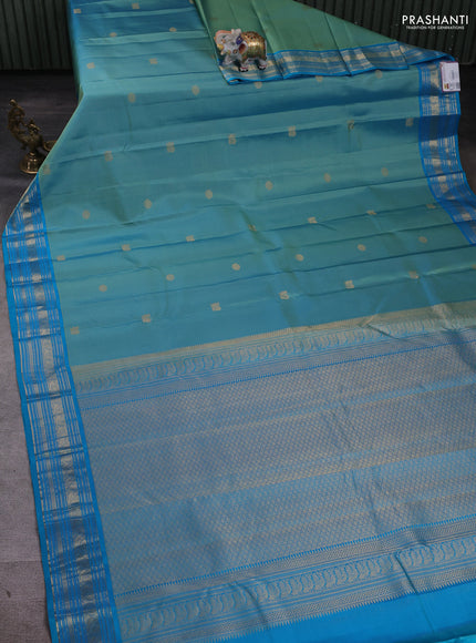 Pure kanchipuram silk saree teal blue with allover zari weaves and zari woven border