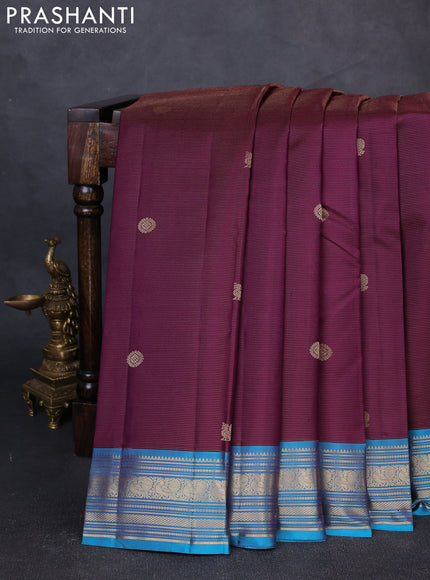 Pure kanchipuram silk saree deep purple and cs blue with allover zari weaves and zari woven border