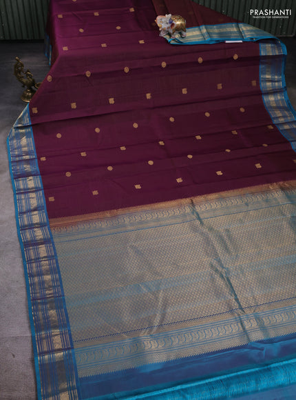 Pure kanchipuram silk saree deep purple and cs blue with allover zari weaves and zari woven border