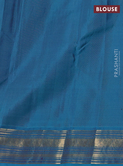 Pure kanchipuram silk saree deep purple and cs blue with allover zari weaves and zari woven border