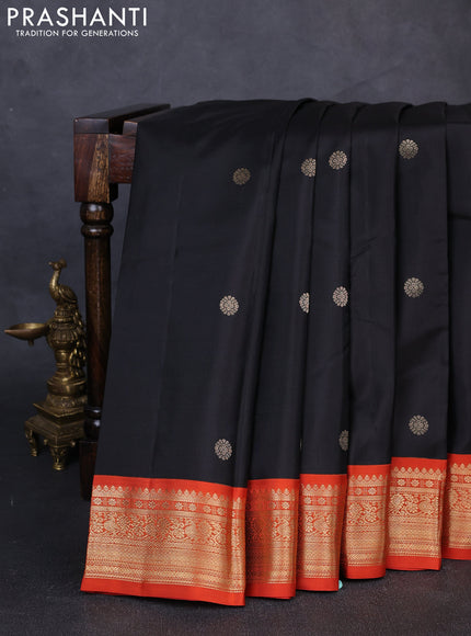 Pure kanchipuram silk saree black and orange with zari woven buttas and zari woven korvai border