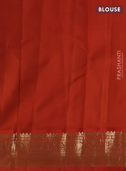 Pure kanchipuram silk saree black and orange with zari woven buttas and zari woven korvai border
