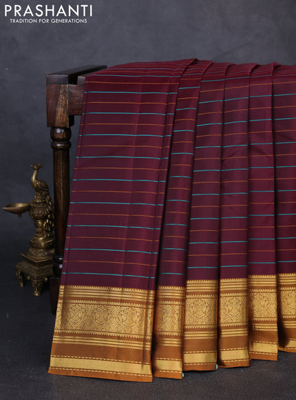 Pure kanchipuram silk saree deep maroon and dark mustard with allover thread stripes pattern and ganga jamuna border