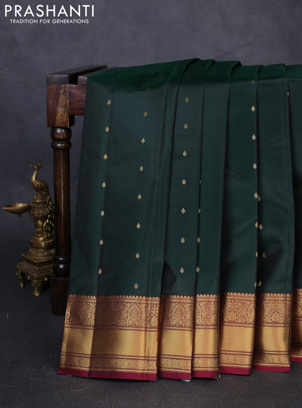 Pure kanchipuram silk saree dark green and maroon with zari woven buttas and zari woven border