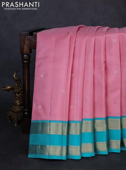 Pure kanchipuram silk saree pastel pink and teal blue with zari woven buttas and rettapet zari woven butta border