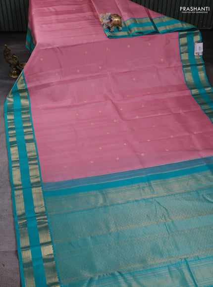 Pure kanchipuram silk saree pastel pink and teal blue with zari woven buttas and rettapet zari woven butta border
