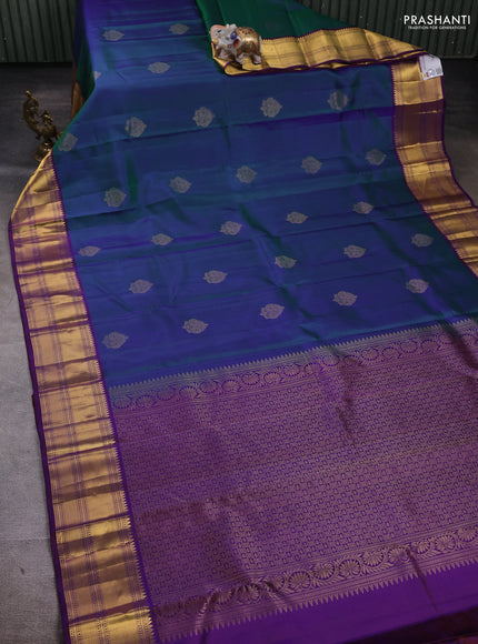 Pure kanchipuram silk saree dual shade of bluish green and purple with zari woven buttas and zari woven border