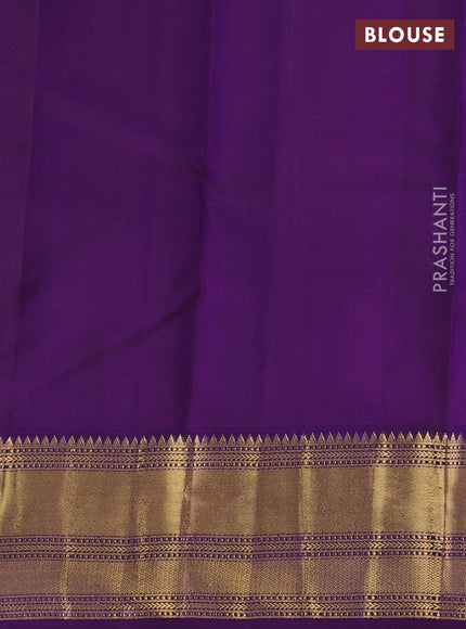 Pure kanchipuram silk saree dual shade of bluish green and purple with zari woven buttas and zari woven border
