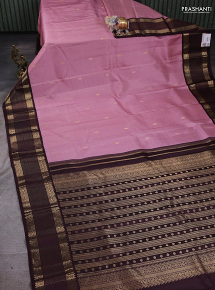 Pure kanchipuram silk saree pastel pink and deep wine shade with zari woven buttas and zari woven korvai border