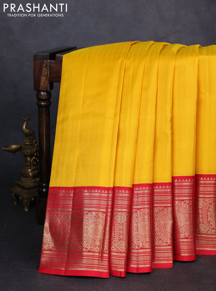 Pure kanchipuram silk saree yellow and red with allover zari checks & buttas and long zari woven korvai border