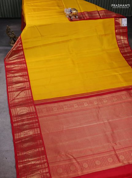 Pure kanchipuram silk saree yellow and red with allover zari checks & buttas and long zari woven korvai border