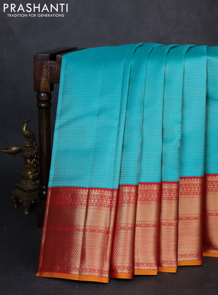 Pure kanchipuram silk saree teal blue and red with allover zari checked pattern and long zari woven korvai border