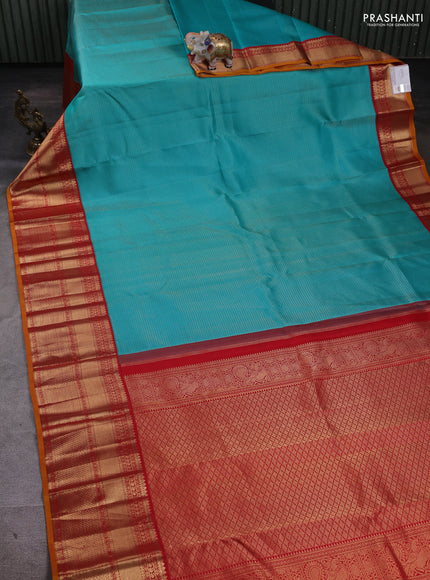 Pure kanchipuram silk saree teal blue and red with allover zari checked pattern and long zari woven korvai border