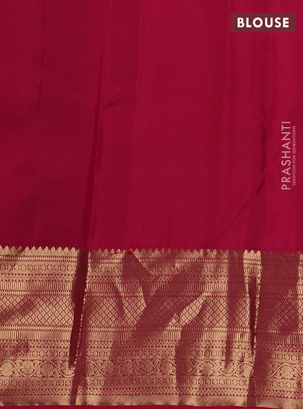 Pure kanchipuram silk saree green and reddish pink with allover zari weaves and zari woven border