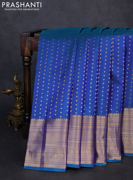 Pure kanchipuram silk saree dual shade of teal blue and reddish pink with allover zari woven 1000 buttas and zari woven border