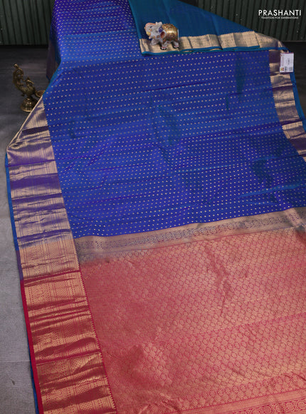 Pure kanchipuram silk saree dual shade of teal blue and reddish pink with allover zari woven 1000 buttas and zari woven border