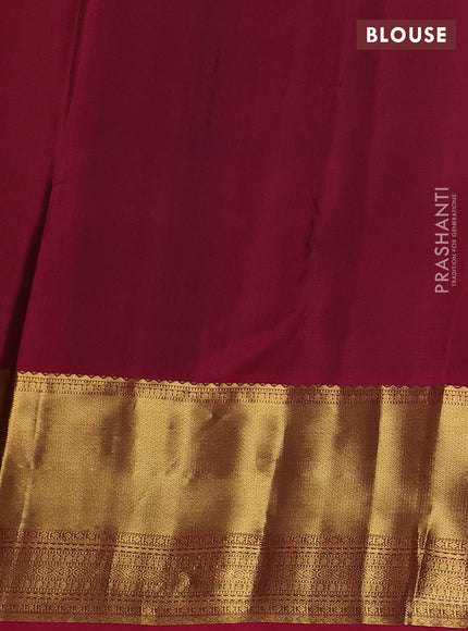 Pure kanchipuram silk saree parrot green and pink with allover small zari checked pattern and long zari woven border