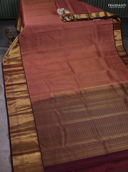 Pure kanchipuram silk saree pastel peach and coffee brown with allover small zari checked pattern and long zari woven border