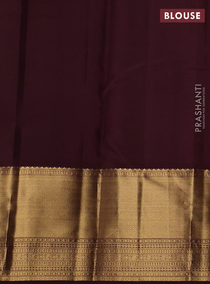Pure kanchipuram silk saree pastel peach and coffee brown with allover small zari checked pattern and long zari woven border
