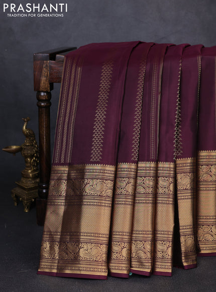 Pure kanchipuram silk saree wine shade with allover zari weaves and long zari woven border