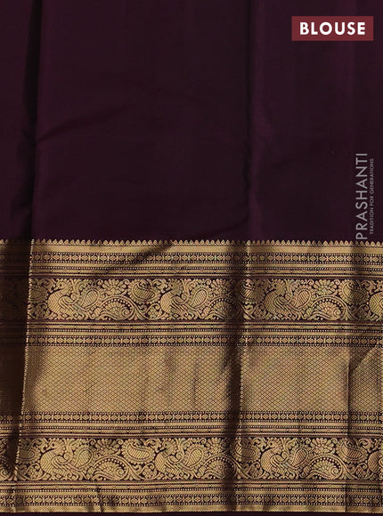 Pure kanchipuram silk saree wine shade with allover zari weaves and long zari woven border