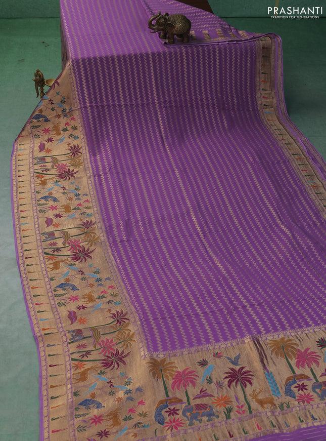 Art Georgette saree lavender with allover zari weaves and zari woven paithani design border