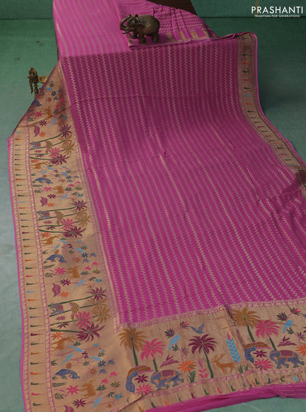 Art Georgette saree light pink with allover zari weaves and zari woven paithani design border