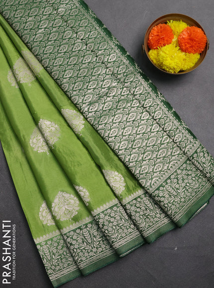 Banarasi semi crepe saree pastel green and green with silver zari woven buttas and silver zari woven border