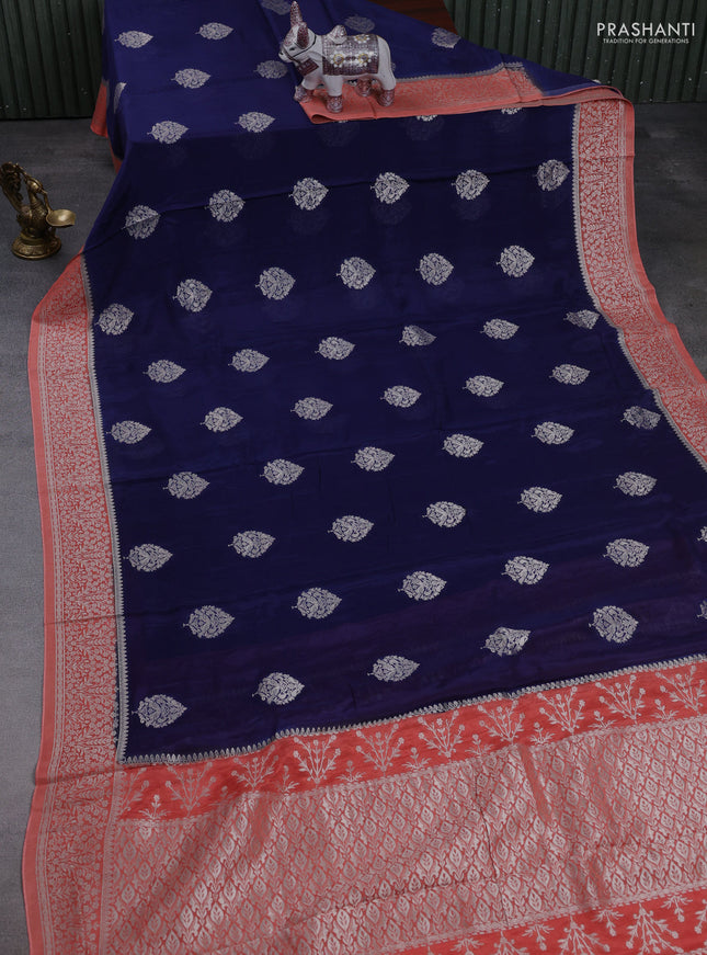 Banarasi semi crepe saree navy blue and peach orange with silver zari woven buttas and silver zari woven border