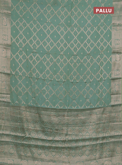 Semi chanderi saree pastel green with allover zari weaves and zari woven border