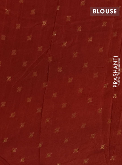 Semi mysore silk saree rust shade with plain body and zari woven border
