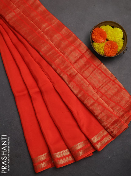 Semi mysore silk saree orange with plain body and zari woven border
