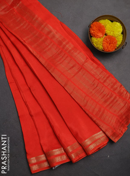 Semi mysore silk saree orange with plain body and zari woven border