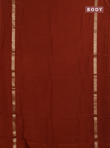 Semi mysore silk saree rust shade with plain body and zari woven simple border