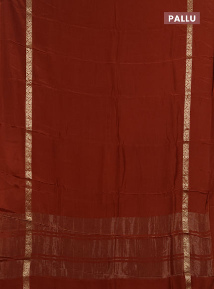 Semi mysore silk saree rust shade with plain body and zari woven simple border