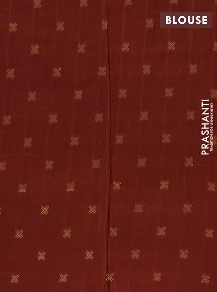 Semi mysore silk saree rust shade with plain body and zari woven simple border