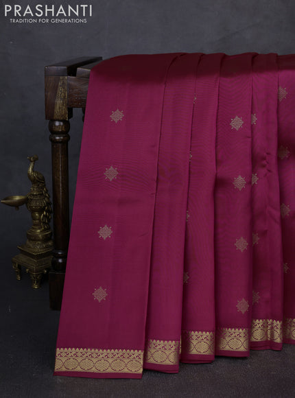 Kanchipuram silk saree dark rani pink and teal green with zari woven buttas and zari woven border