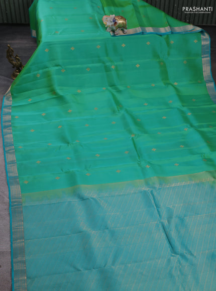 Kanchipuram silk saree dual tone teal green and teal blue with zari woven buttas and zari woven border