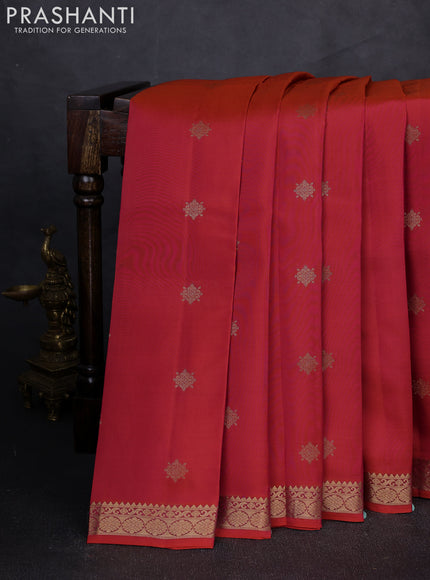 Kanchipuram silk saree pinkish orange with zari woven buttas and zari woven border