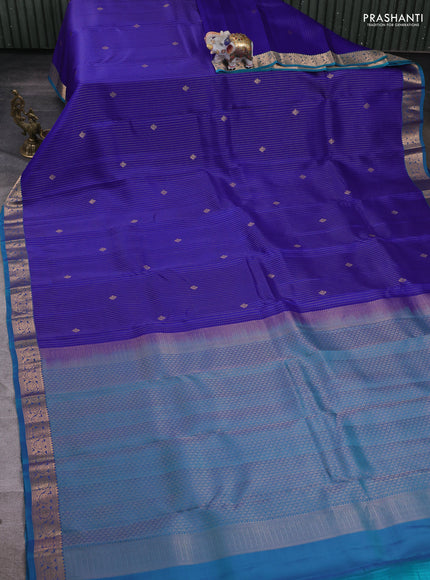 Kanchipuram silk saree blue and teal blue with allover zari stripes & buttas and zari woven border