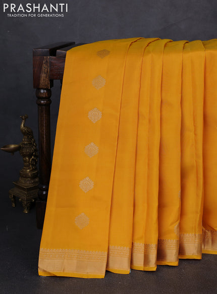 Kanchipuram silk saree mango yellow and purple with zari woven buttas and zari woven border