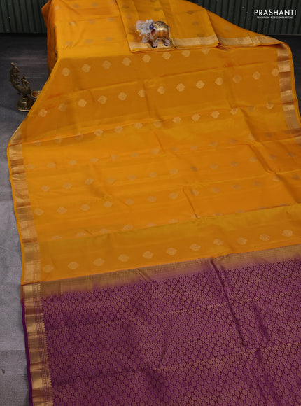 Kanchipuram silk saree mango yellow and purple with zari woven buttas and zari woven border