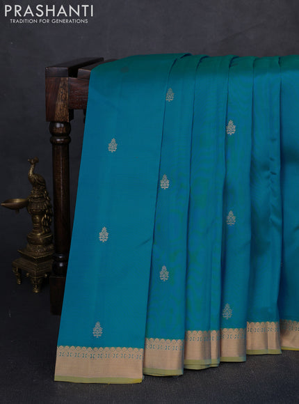 Kanchipuram silk saree teal blue and dual tone light green with zari woven buttas and zari woven border