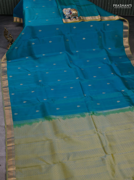 Kanchipuram silk saree teal blue and dual tone light green with zari woven buttas and zari woven border
