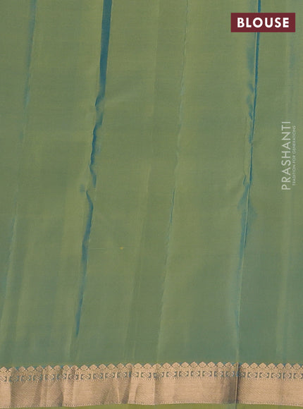 Kanchipuram silk saree teal blue and dual tone light green with zari woven buttas and zari woven border