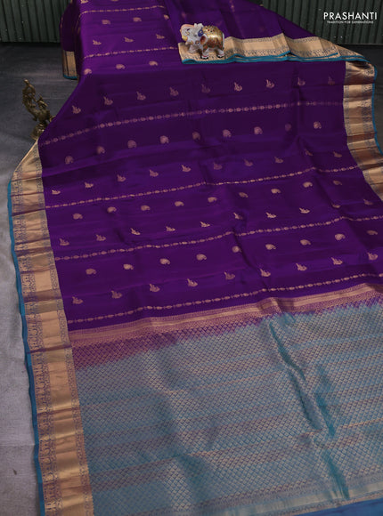 Kanchipuram silk saree purple and teal green with zari woven buttas and zari woven border