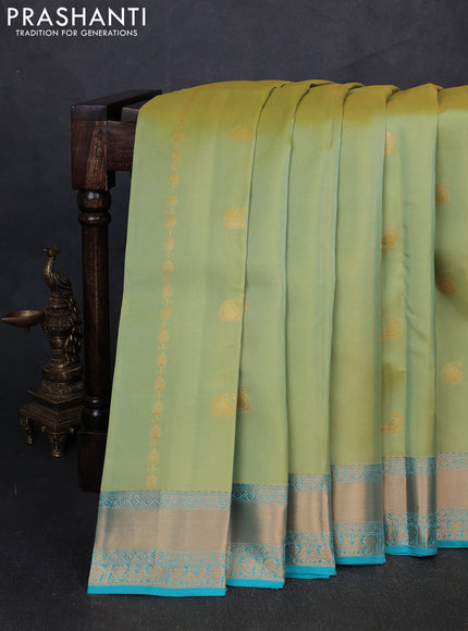 Kanchipuram silk saree dual tone pista green and teal blue with zari woven buttas and zari woven border