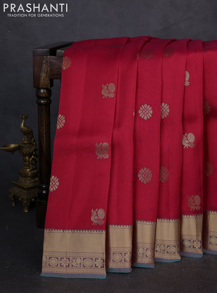 Kanchipuram silk saree tomato pink and dual tone teal green with zari woven buttas and zari woven border