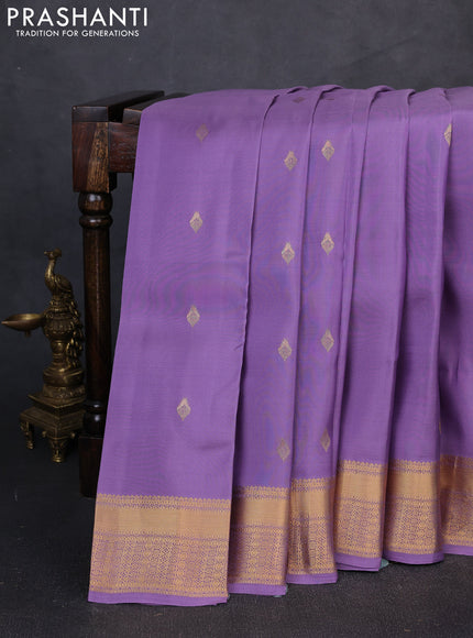 Kanchipuram silk saree lavender and teal green with zari woven buttas and zari woven border