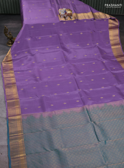 Kanchipuram silk saree lavender and teal green with zari woven buttas and zari woven border